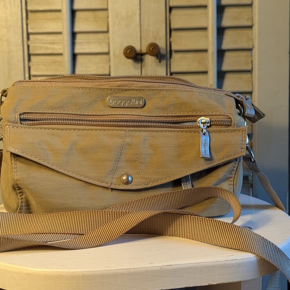 Baggallini khaki nylon crossbody travel bag with logo plate
